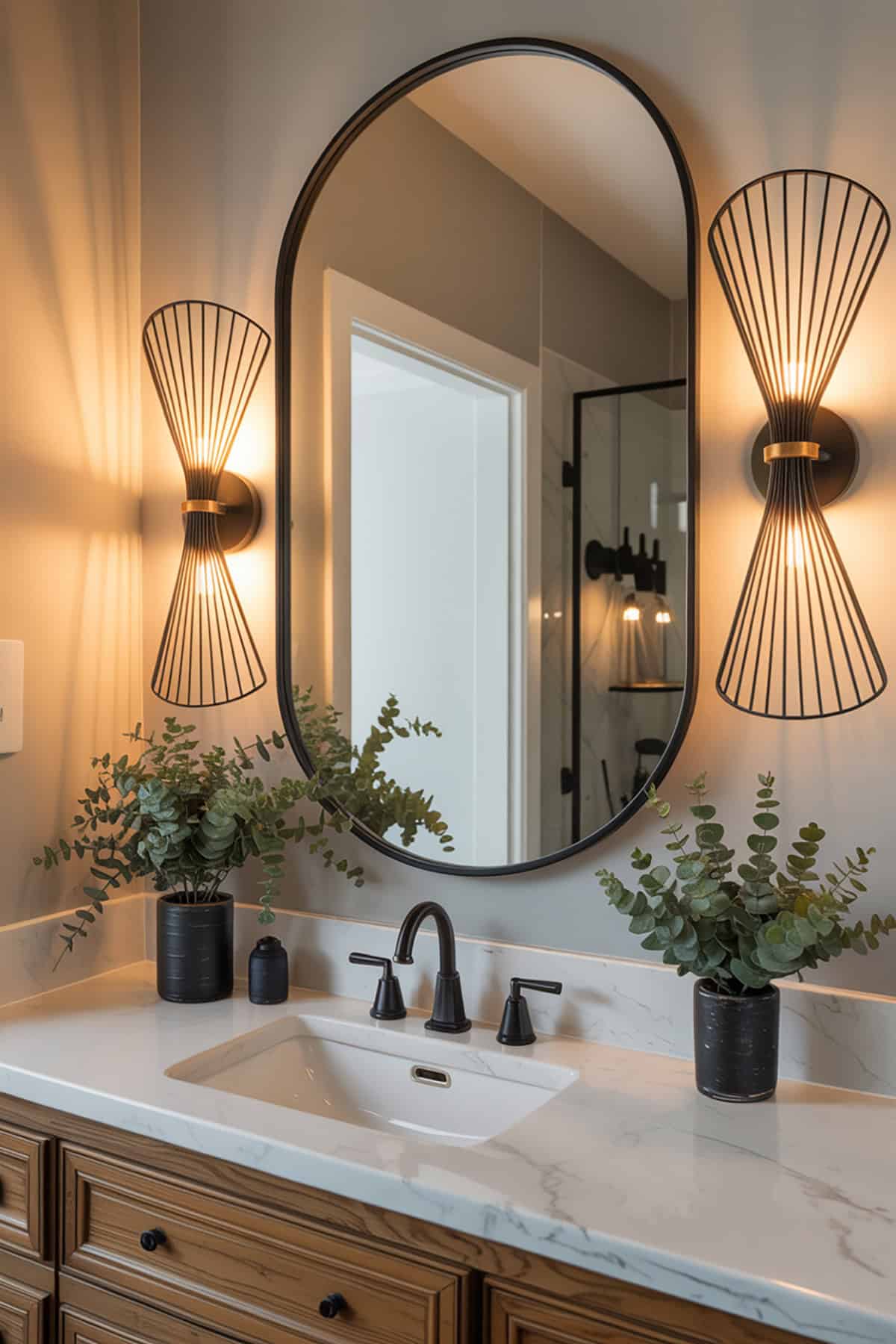 Modern Wall Sconces Flanking the Mirror