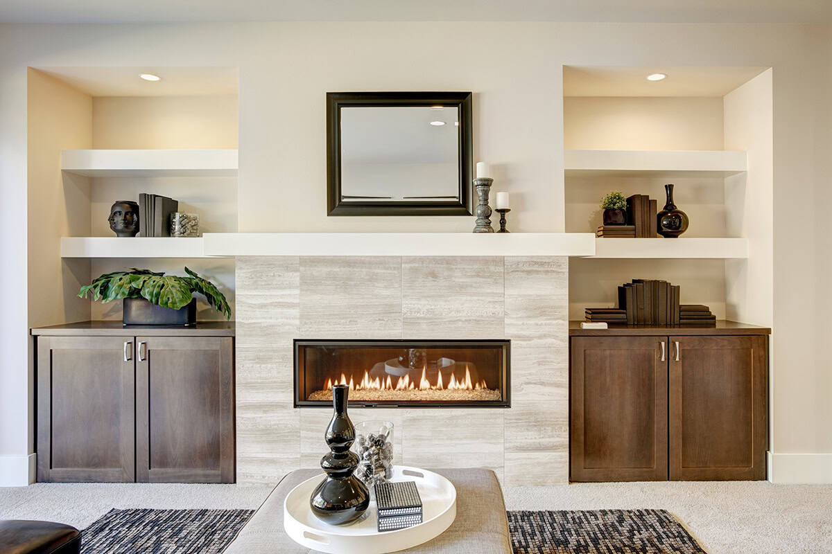 Symmetrical Cabinets Framing a Sleek Fireplace