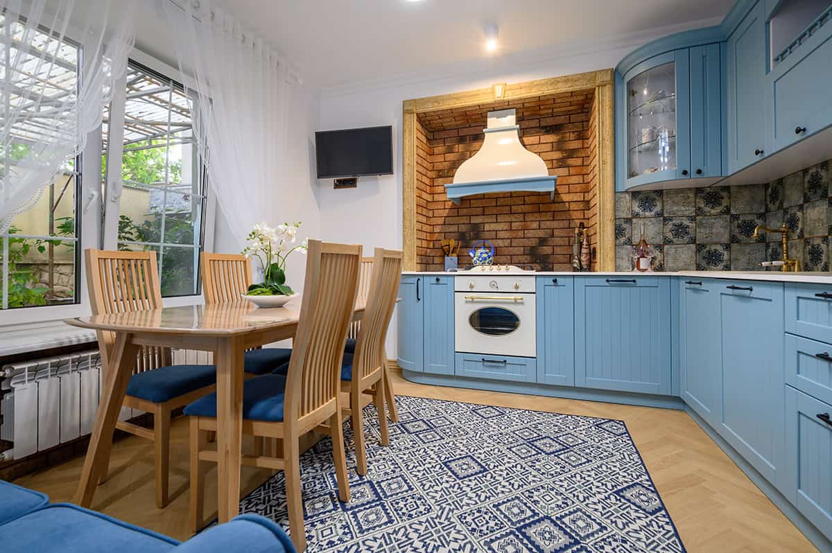 Blue Cottage Charm Meets Rustic Brick