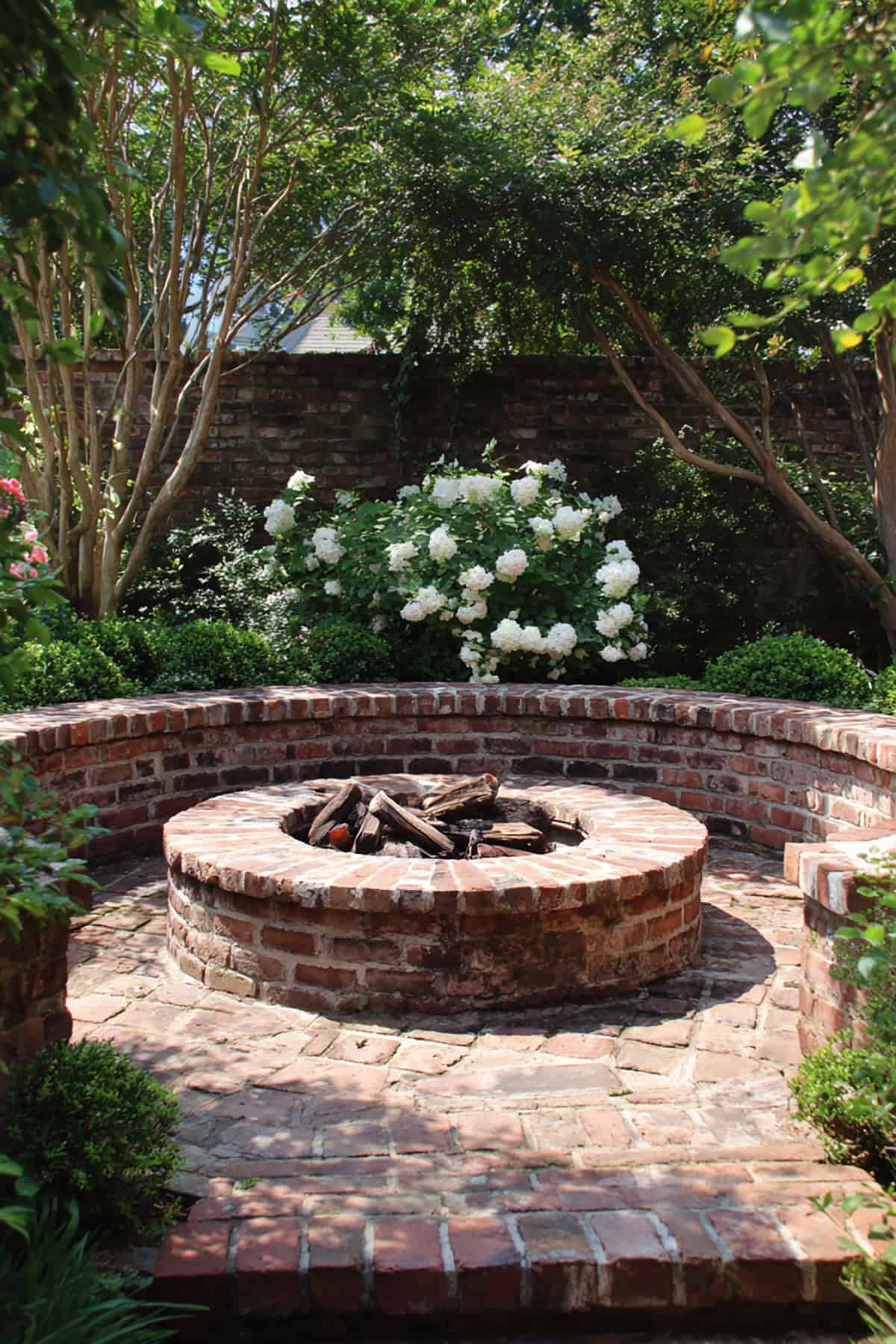 Brick Fire Pit With Raised Planter Beds