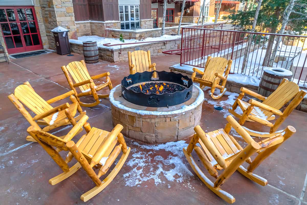Cabin Style Fire Pit with Wooden Rockers