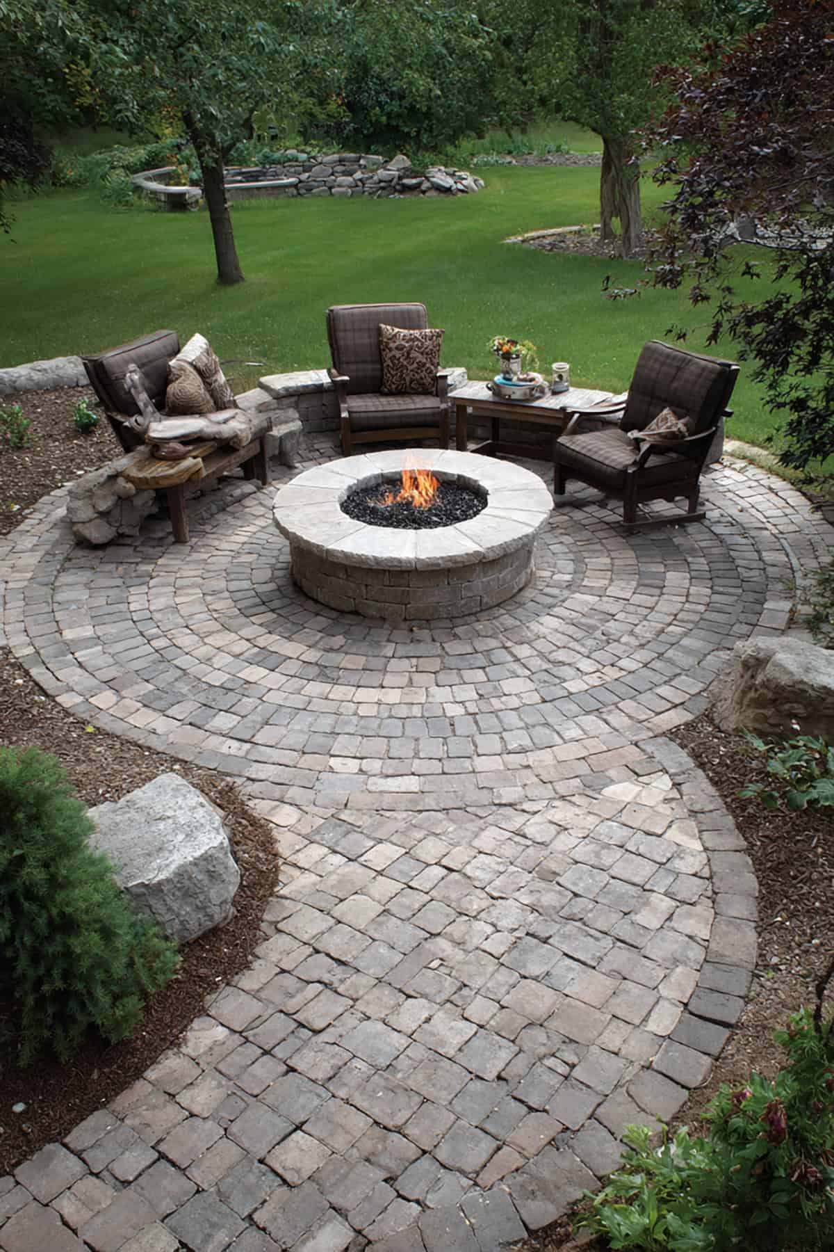 Circular Patio Anchored by Brick Fire Pit