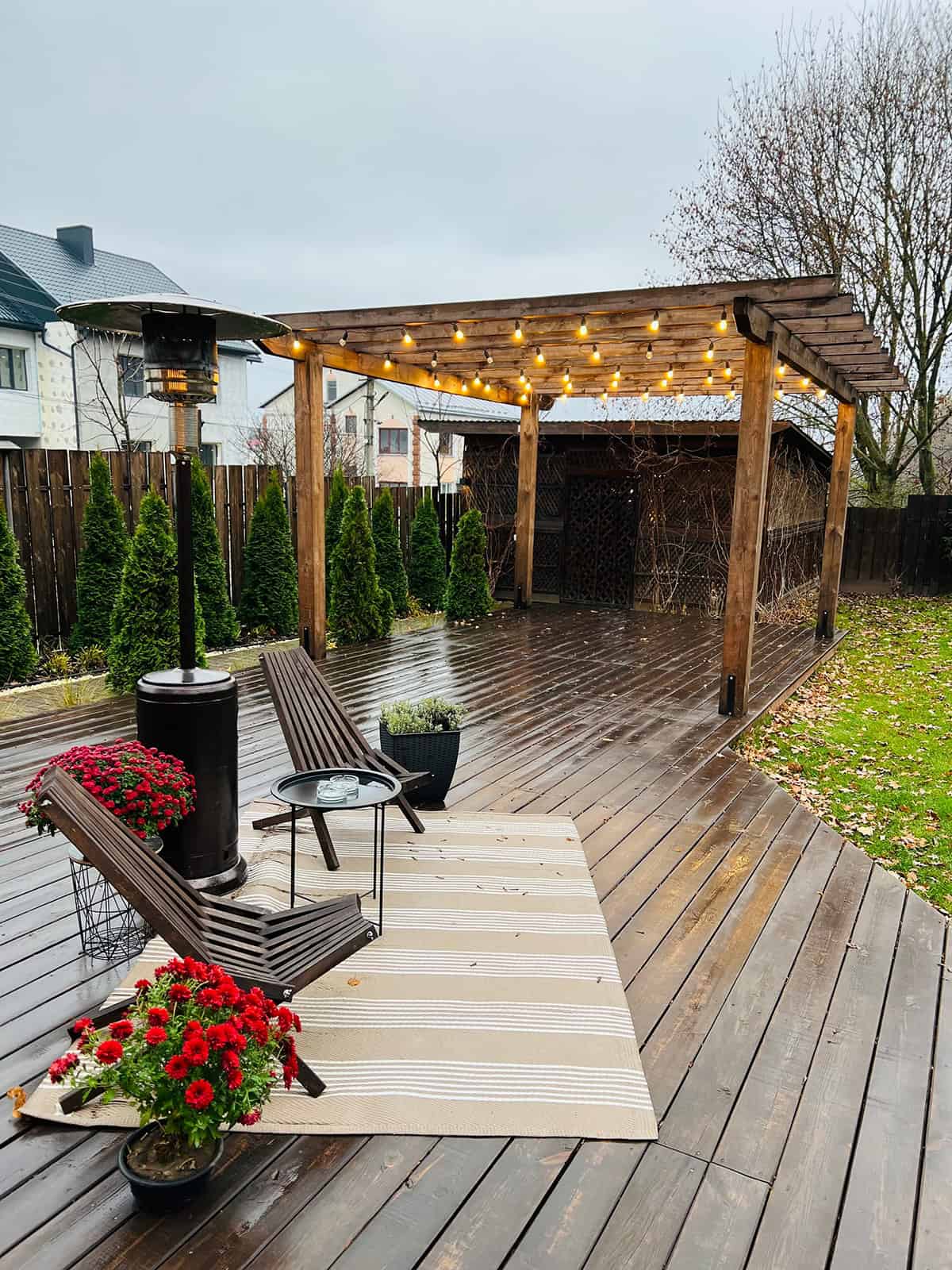 Cozy Deck with String Lights and Bold Blooms