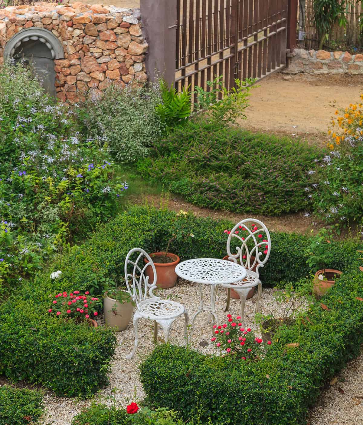 English Cottage Patio with Blooming Garden Borders