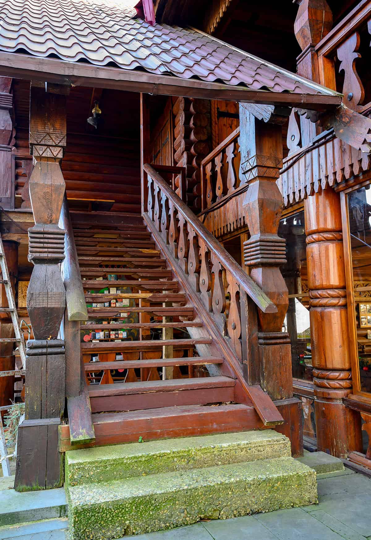 Hand Carved Wooden Porch Columns on a Traditional Staircase