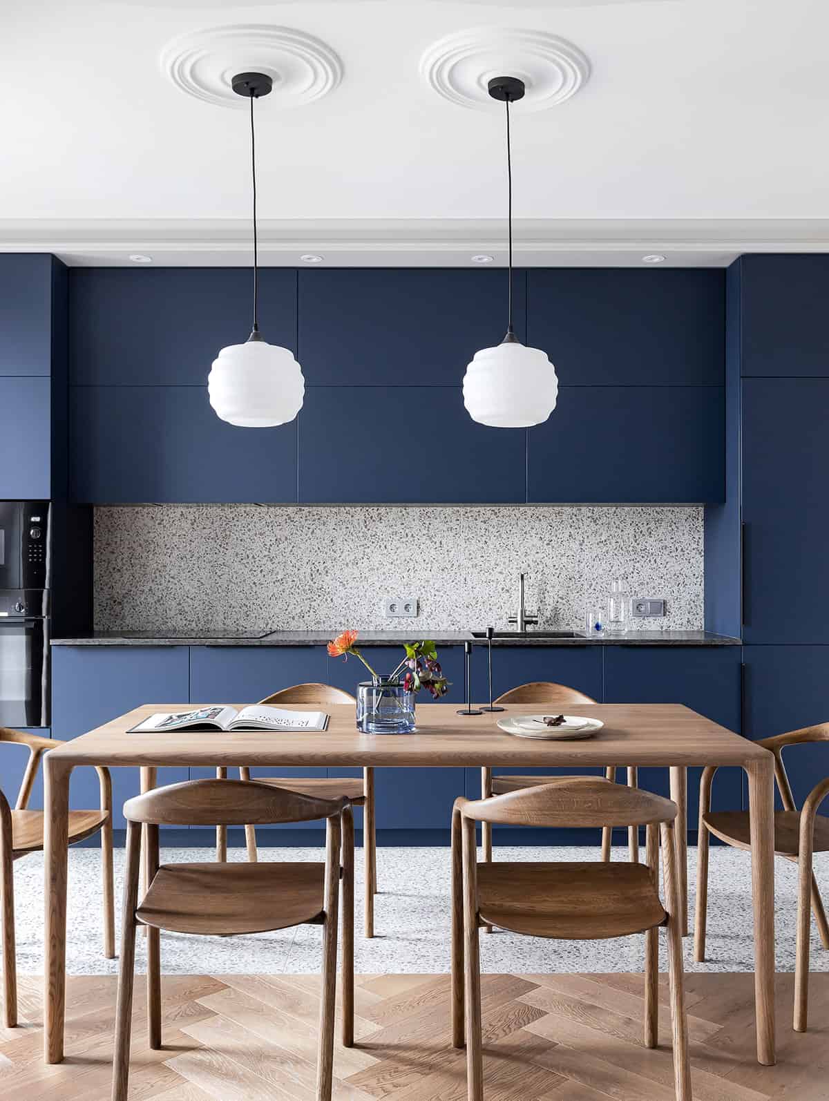 Minimalist Blue Kitchen with Wooden Floor and Tiled Wall