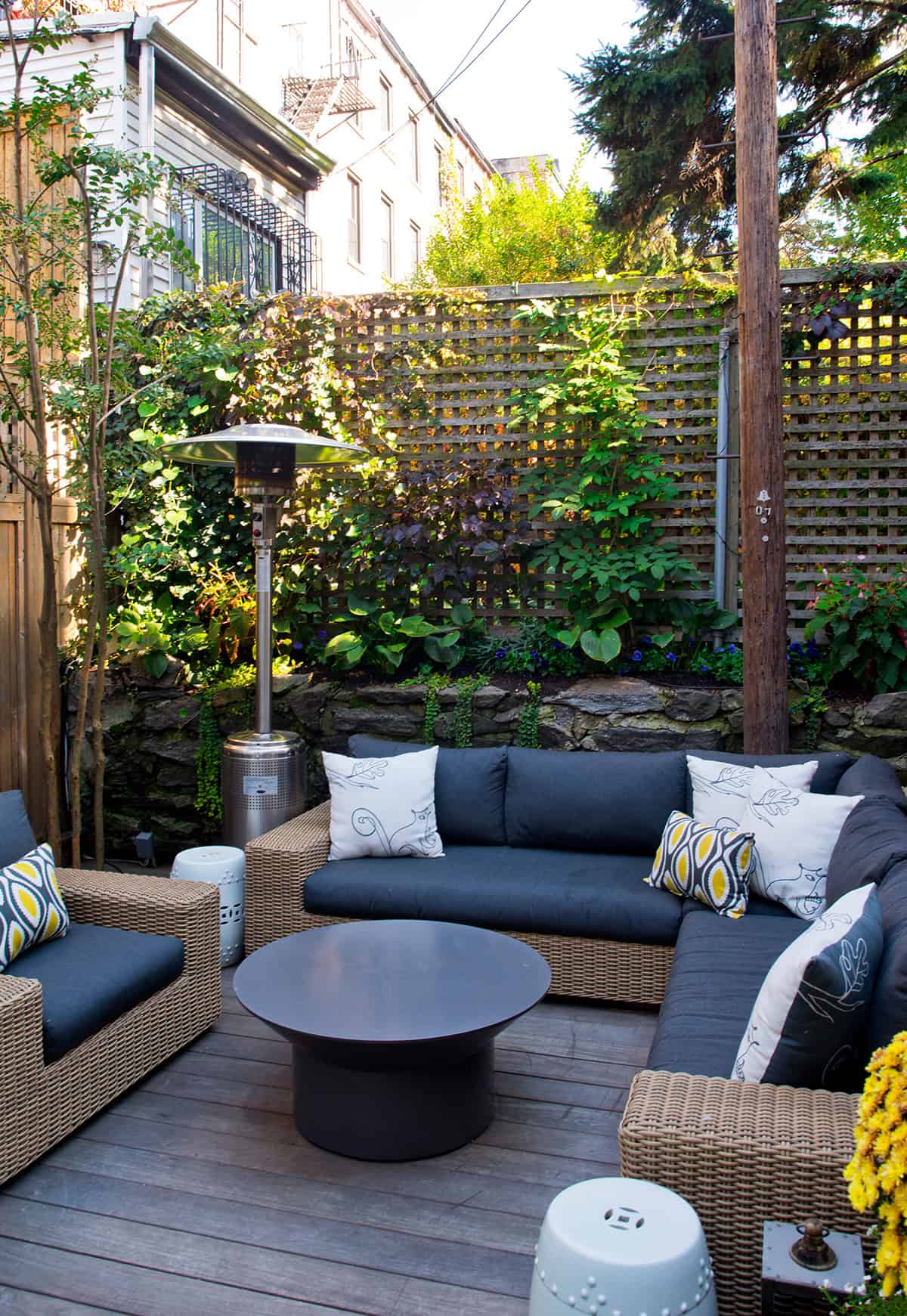 Neutral Outdoor Lounge Surrounded by Greenery