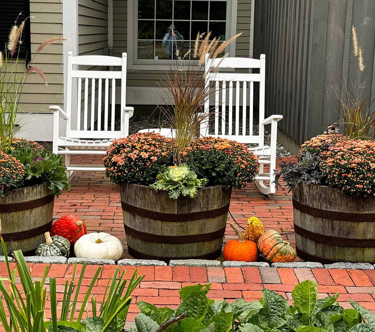 Rocking Chairs Framed by Fall Decor