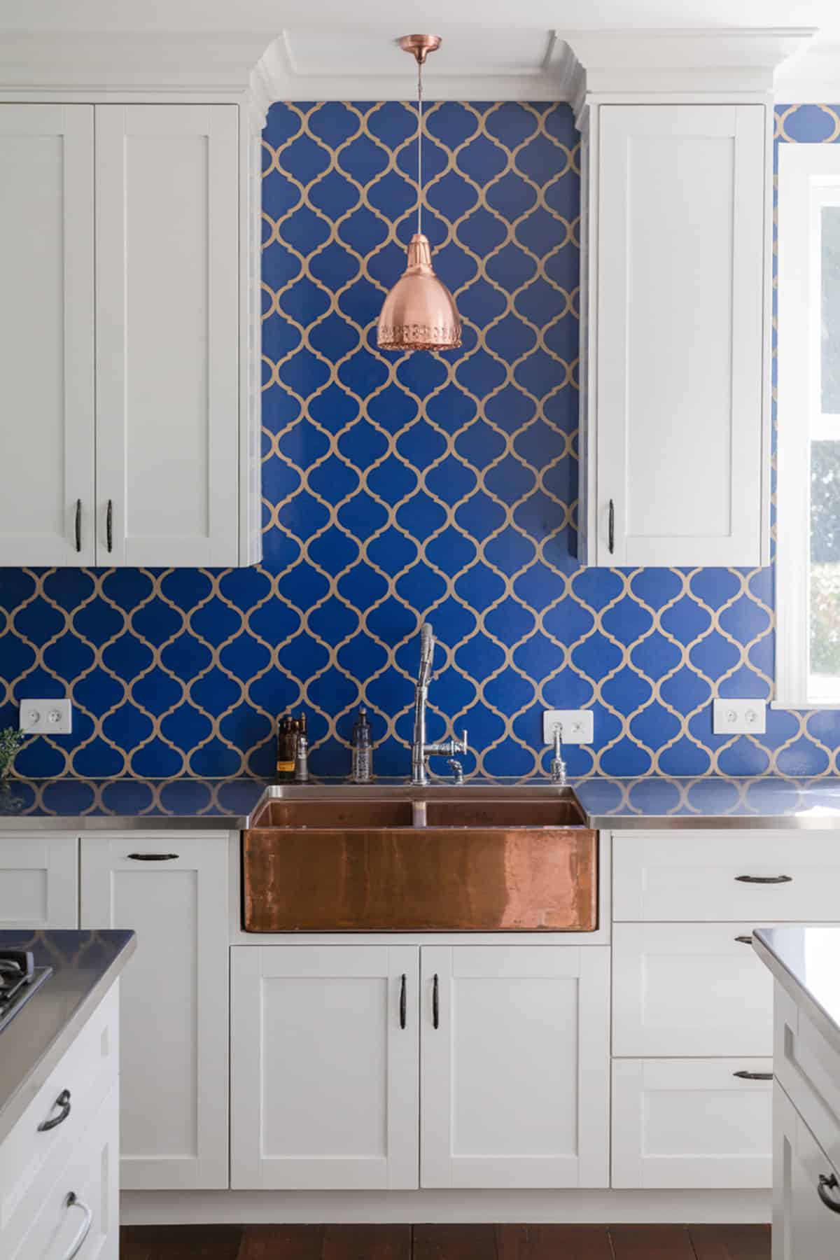 Royal Blue Backsplash with White Cabinets