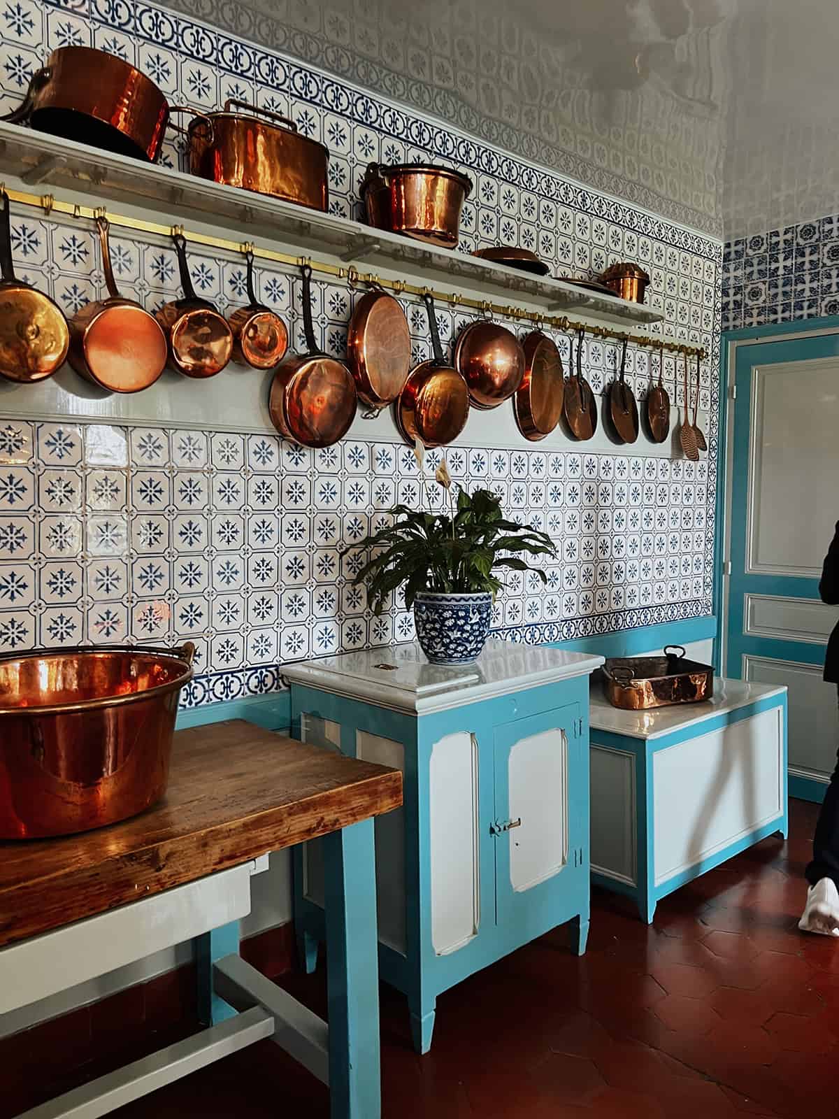 Traditional Kitchen with Patterned Tile Walls and Sky Blue Accents