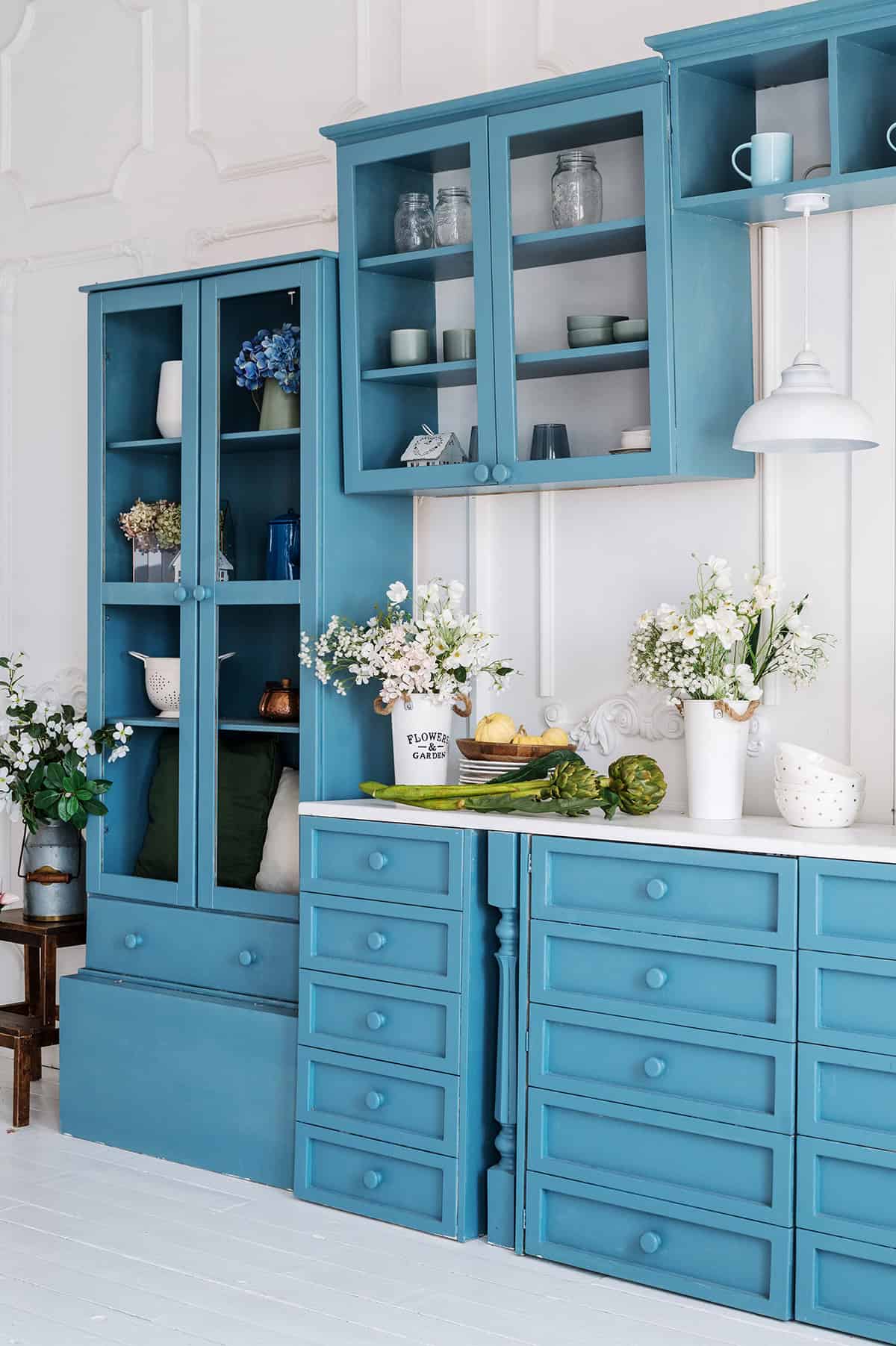 Vintage Inspired Blue Kitchen with Glass Cabinet Doors