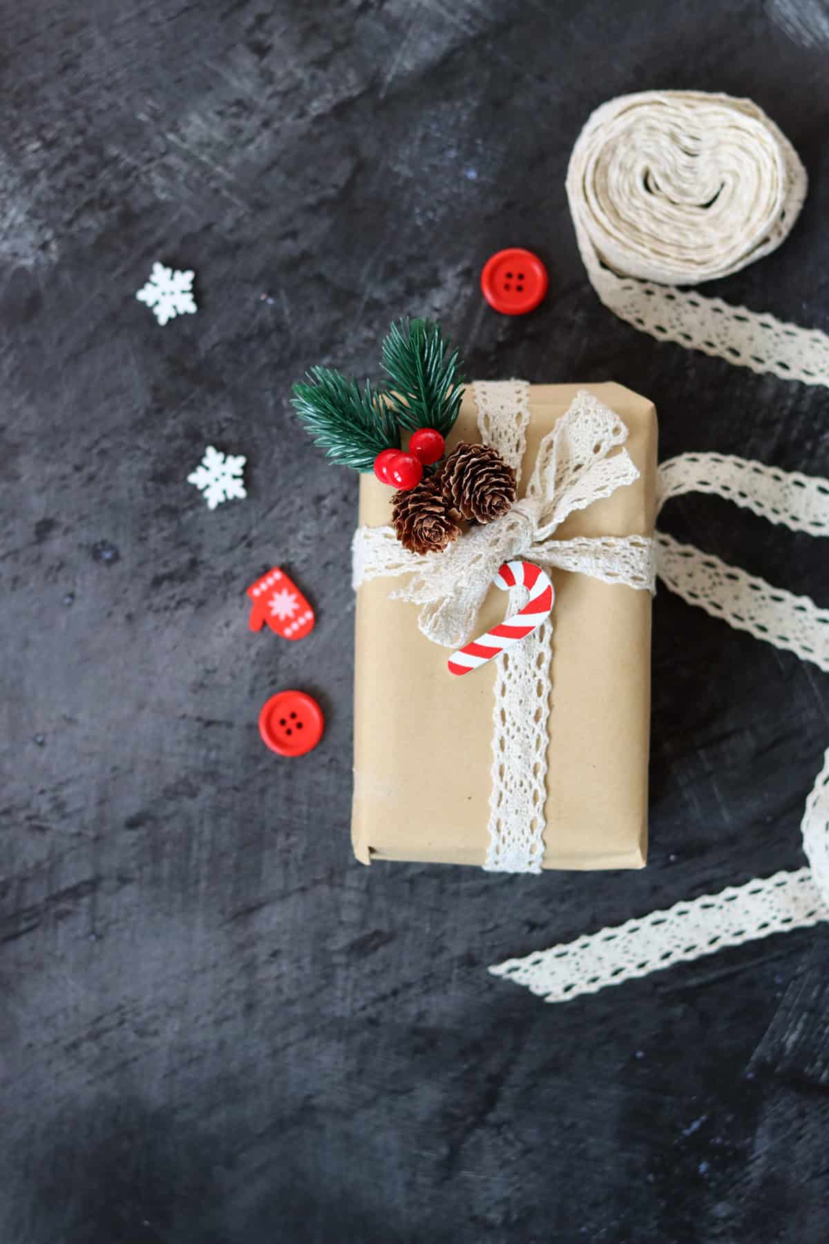 Lace Trim on Kraft with Pinecones and Candy Cane