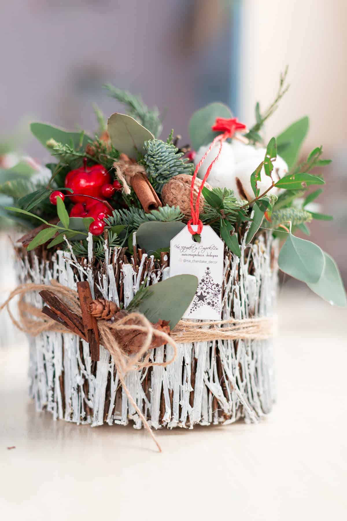 Rustic Basket with Greens, Berries, and Cinnamon
