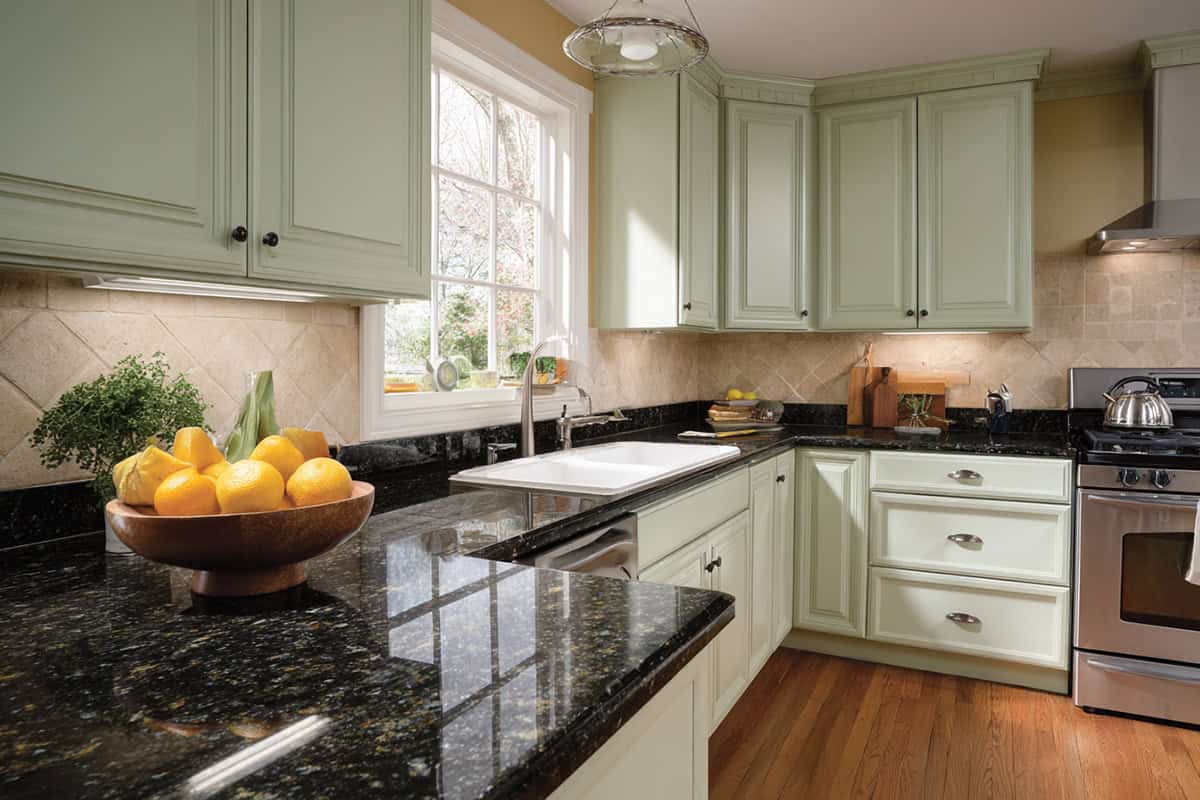 Sage Green Cabinets and Cream Backsplash