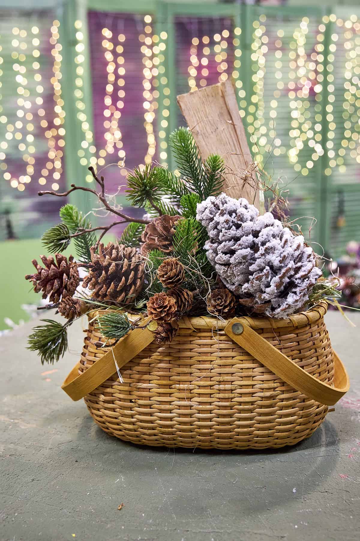 Wicker Basket with Pinecones and Evergreen