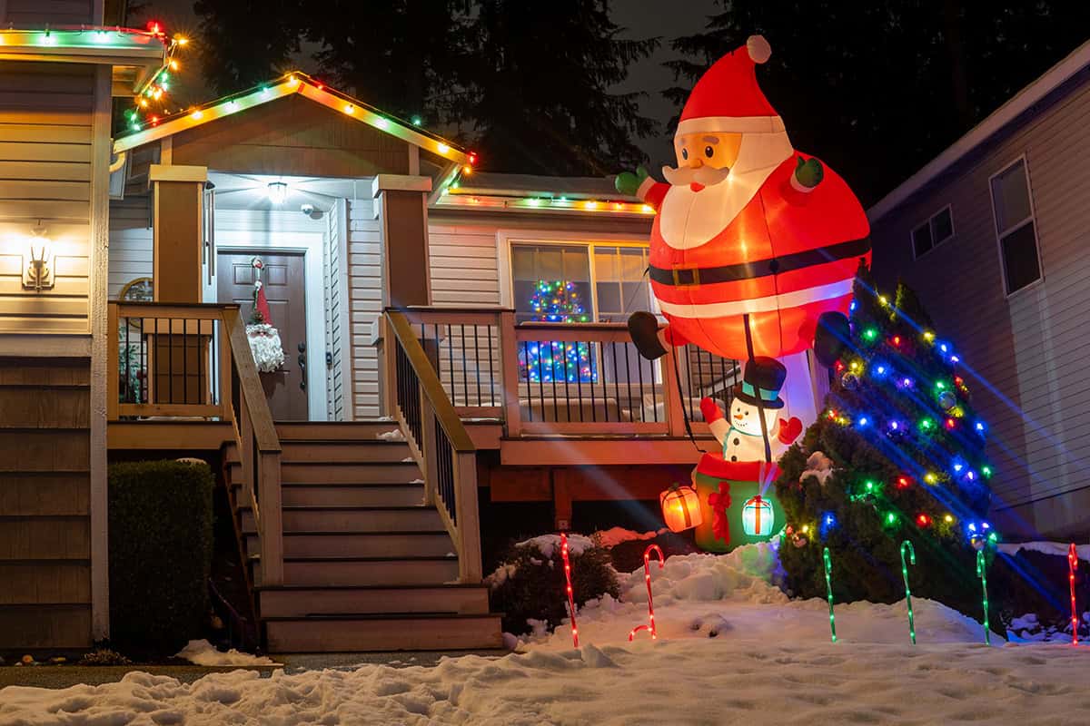 A Yard Claimed by a Towering Santa