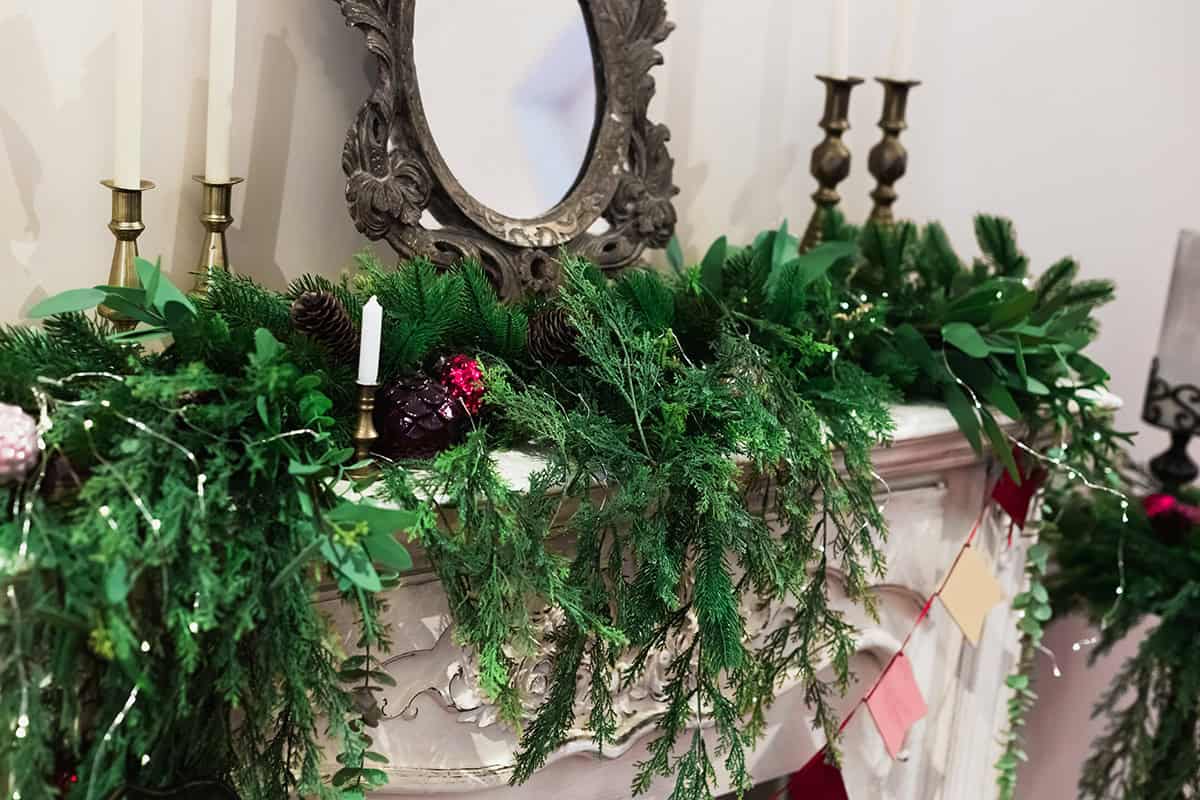 Antique Mirror Mantel with Lush Greenery