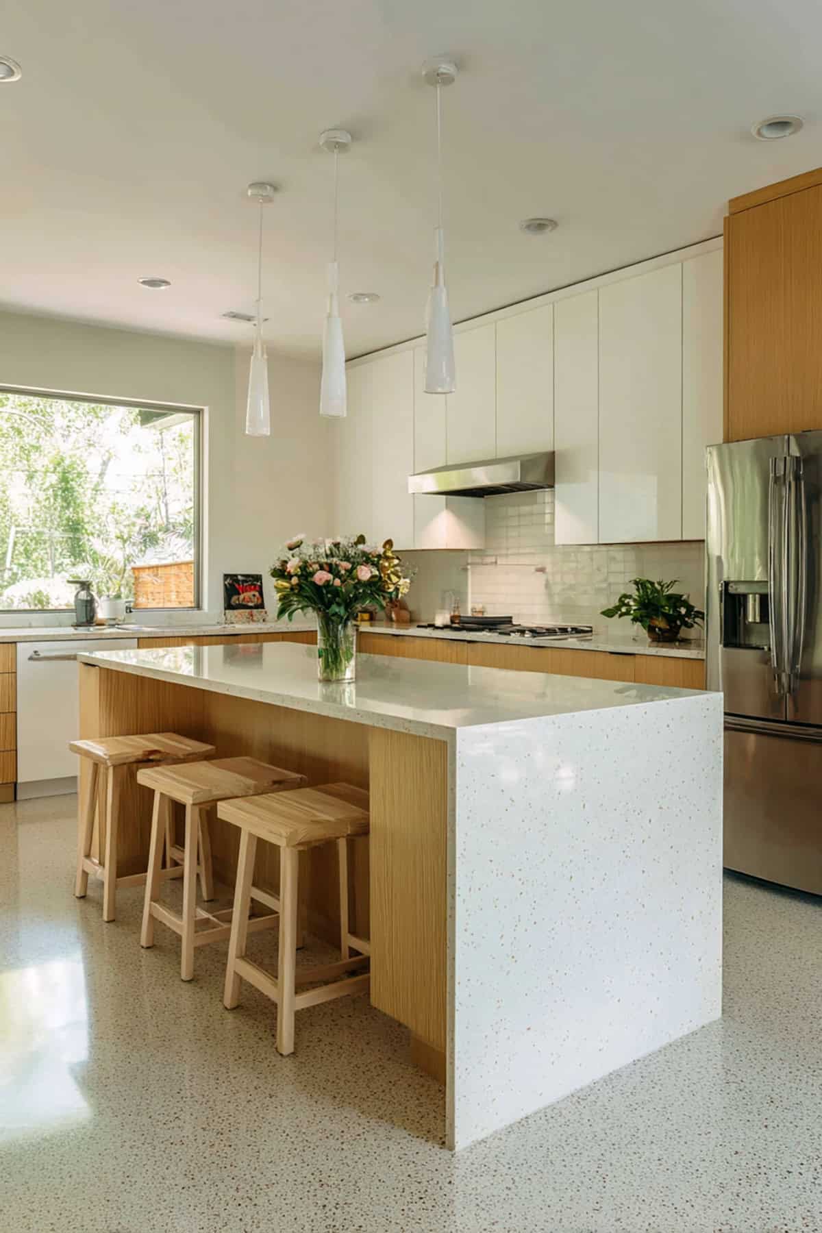 Bright Contemporary Small L Shaped Kitchen with Waterfall Edge Island