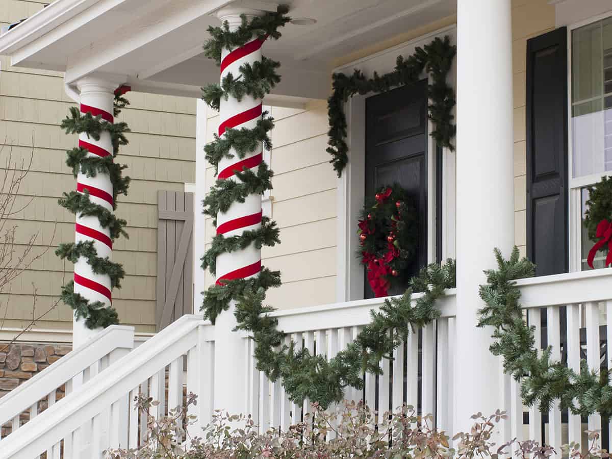 Candy Cane Columns Framing a Black Door