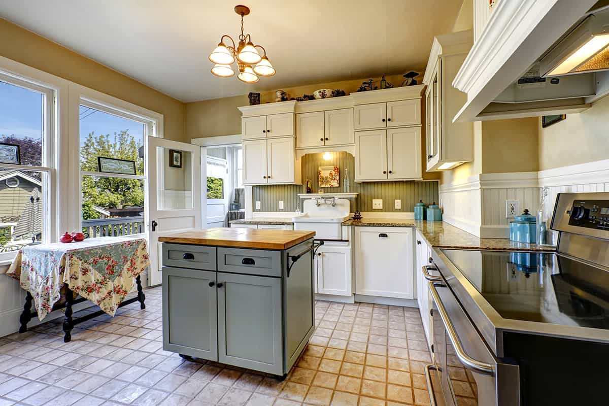 Cottage Style White Cabinets with a Mobile Island