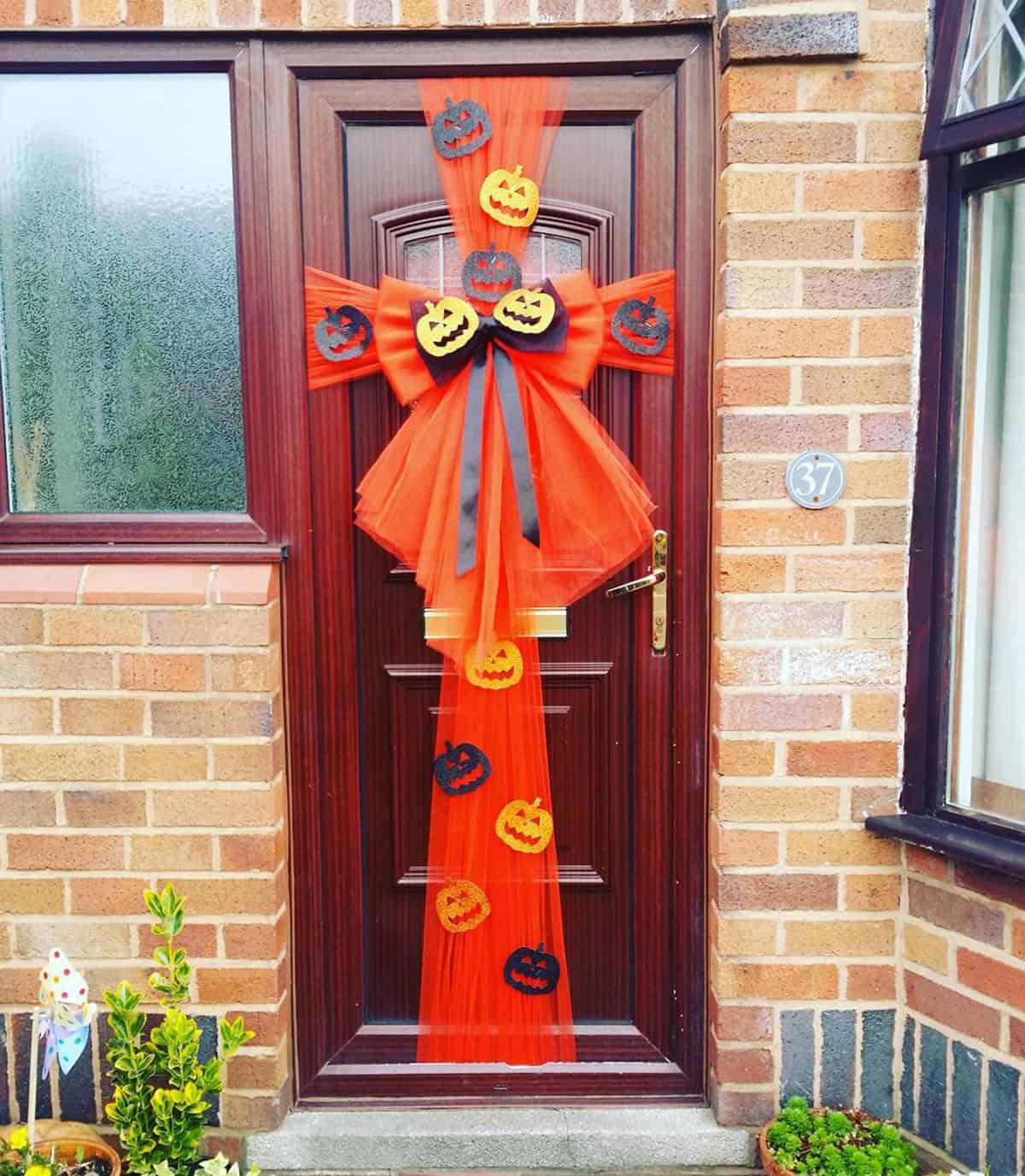 Door Wrapped in Orange Tulle