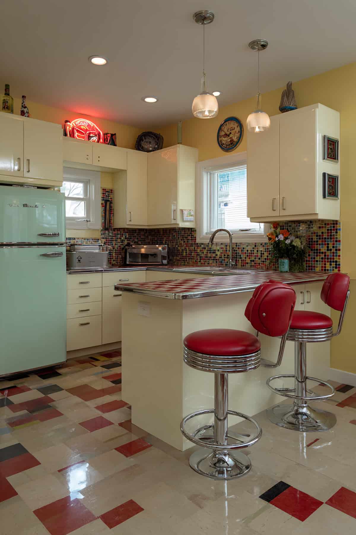 Retro Inspired Small L Shaped Kitchen with Checker Island
