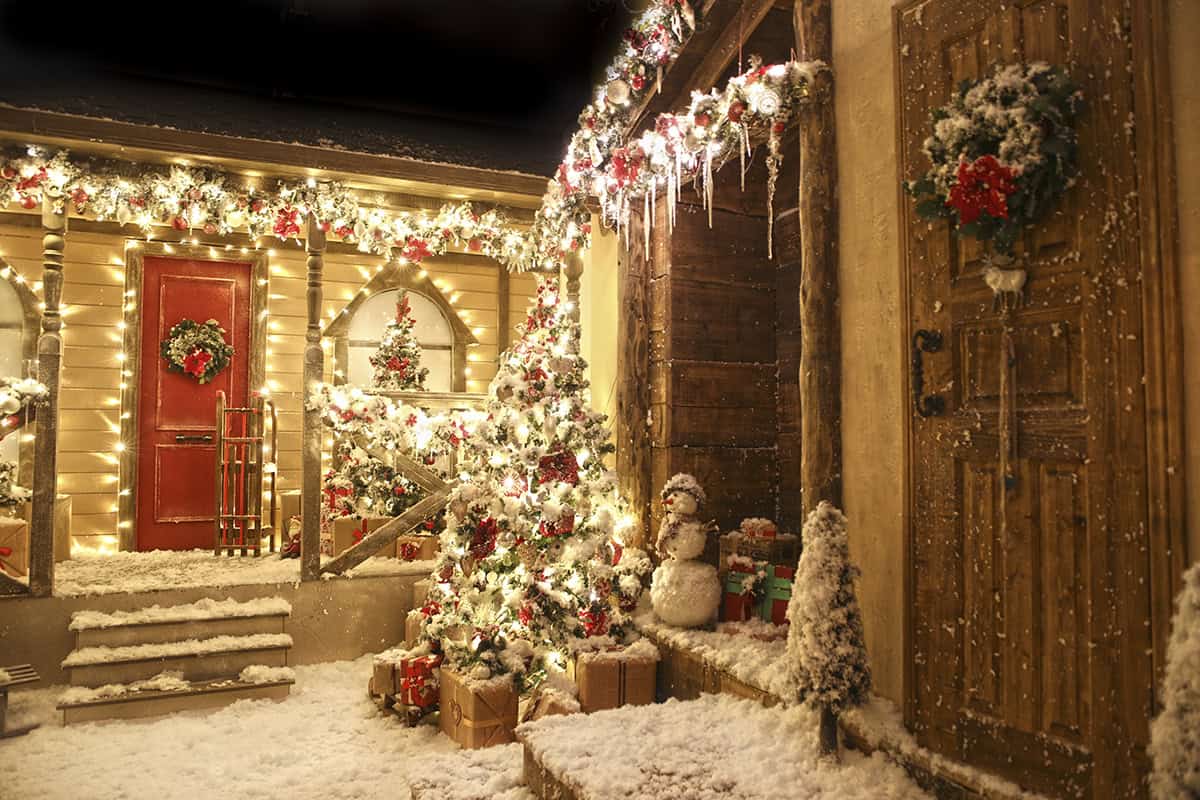 Snowbound Porch with a Red Door That Glows