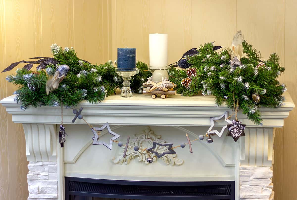White Fireplace with Forest Toned Garland
