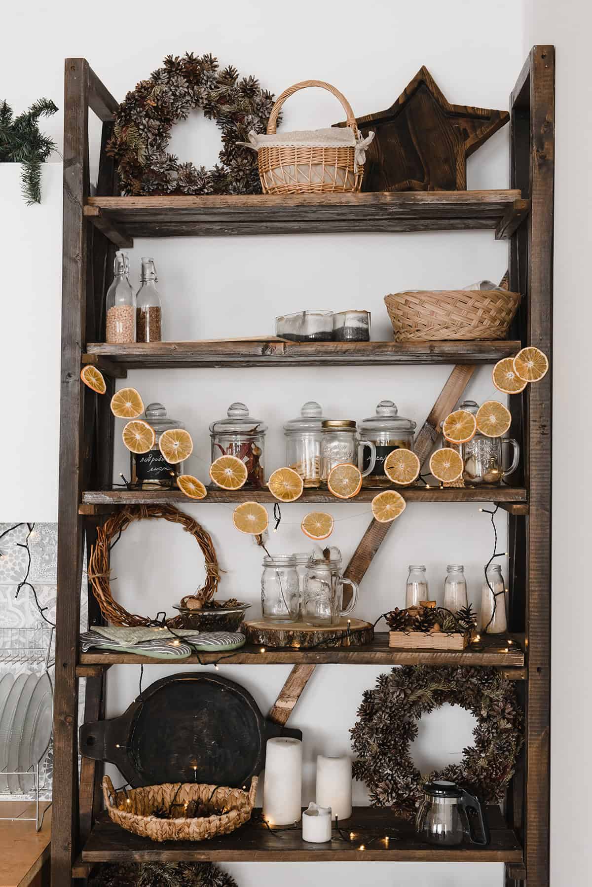 Citrus and Pine on Open Wood Shelves