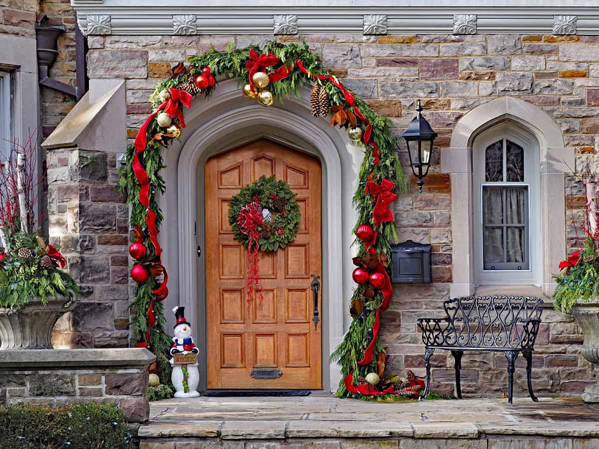 Classic Garland Entrance with Holiday Warmth