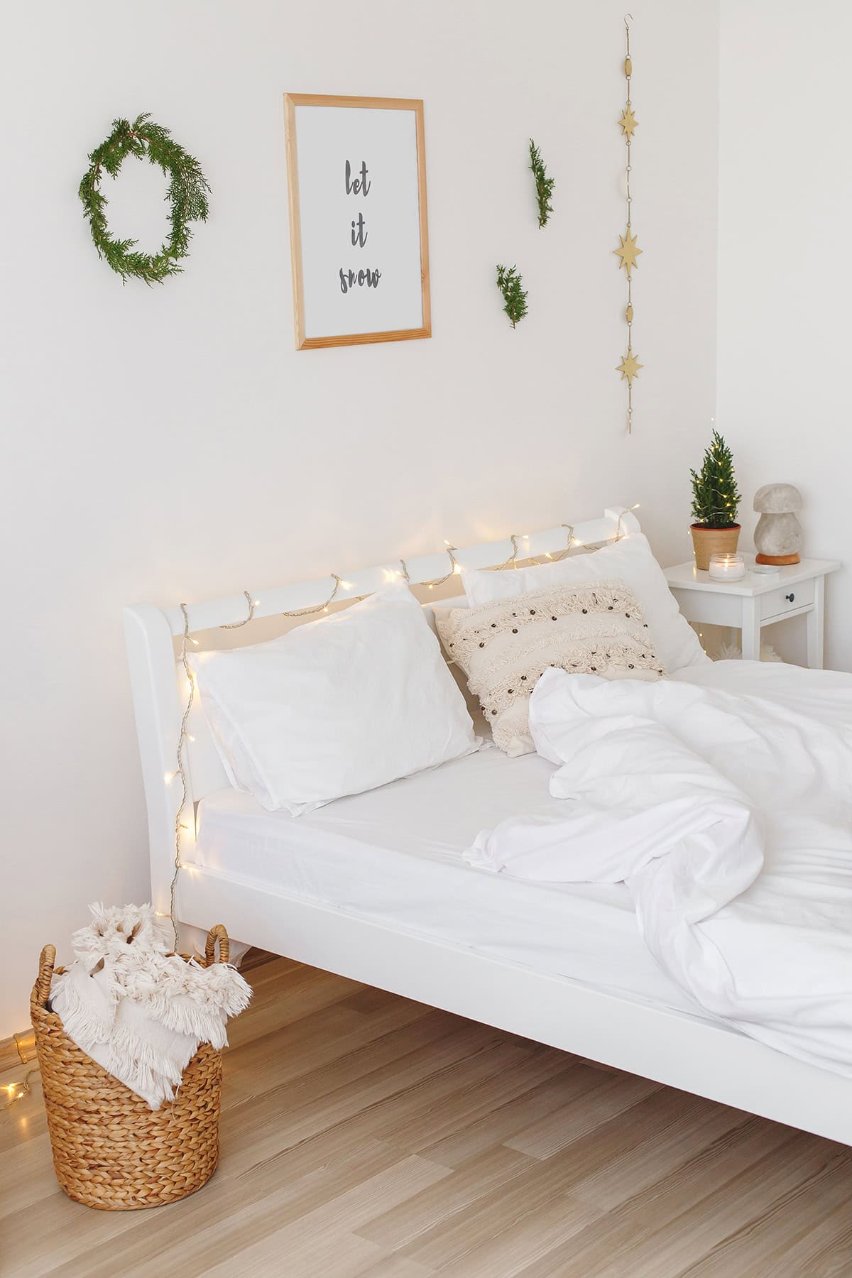 DIY Garland Over Bed Frame