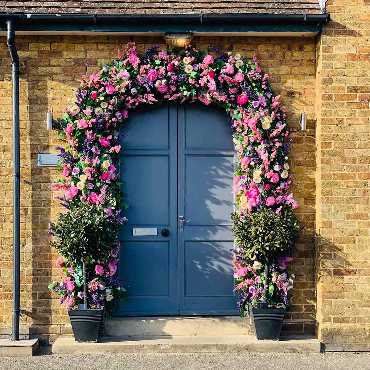 Floral Fantasy Around a Blue Door