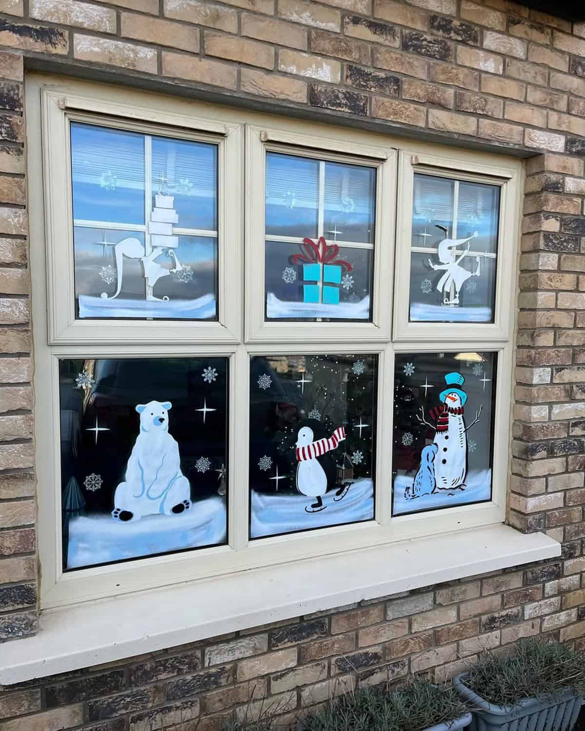 Frost Friends Across the Windowpanes