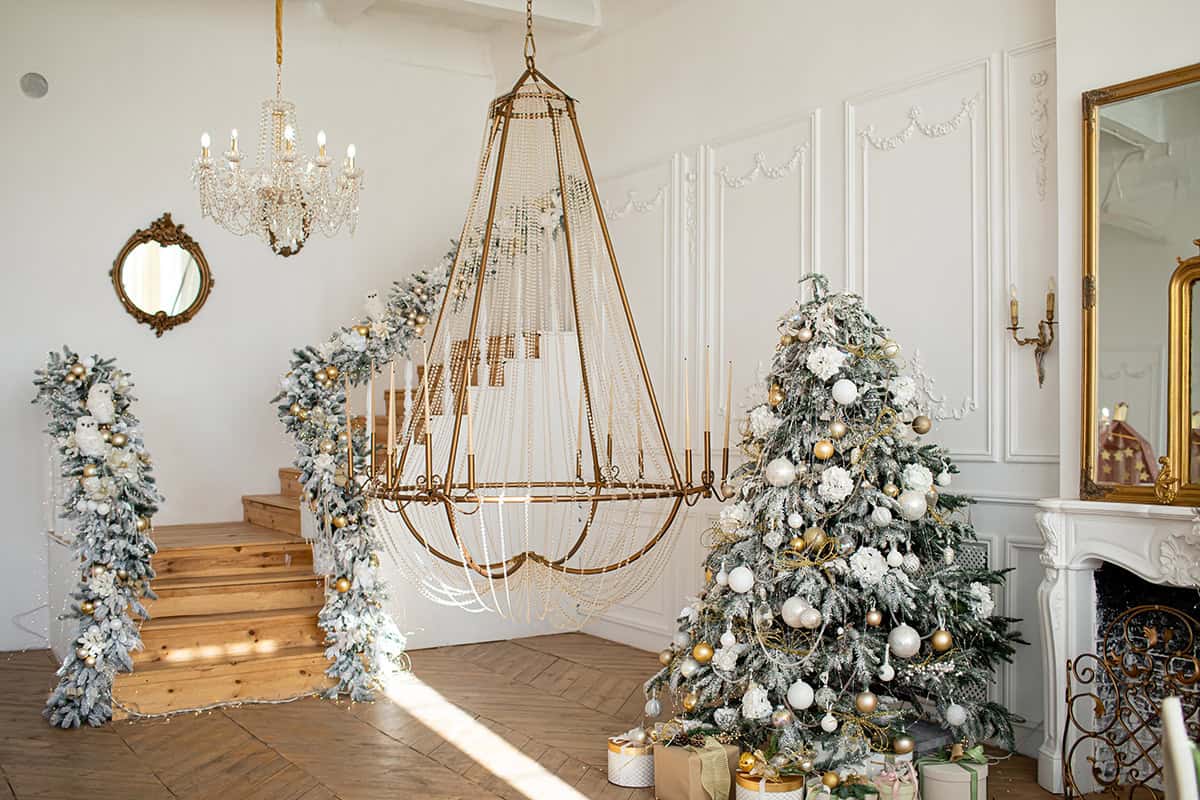 Grand White Staircase with Flocked Garland and Gold Decor
