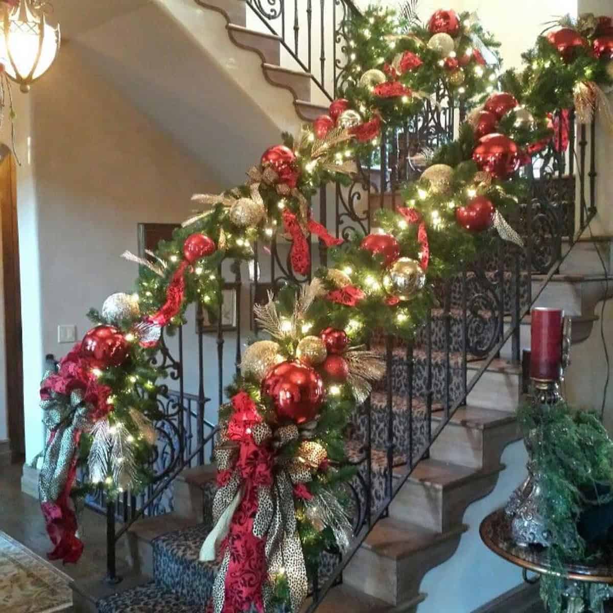 Red and Gold Ribbon Garland on Curved Stairs