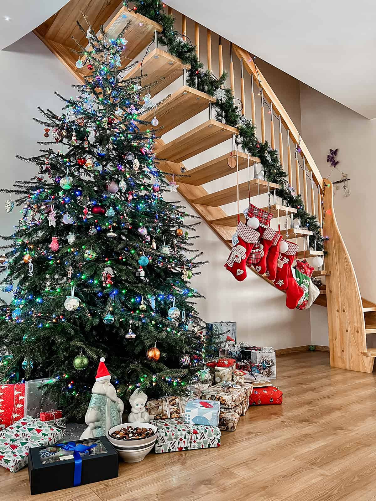 Tree and Staircase Christmas Display with Hanging Stockings