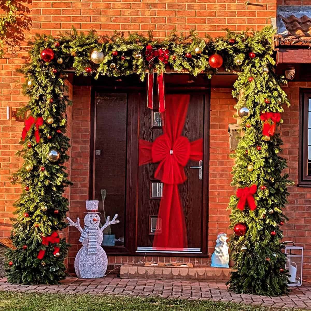 Wrapped Door with Garland and Snowman