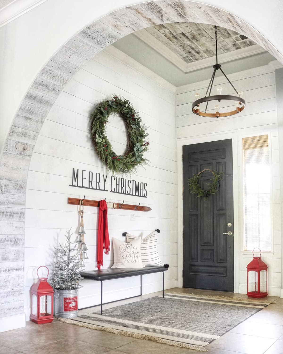 Wreath and Lanterns Framing a Cozy Entrance