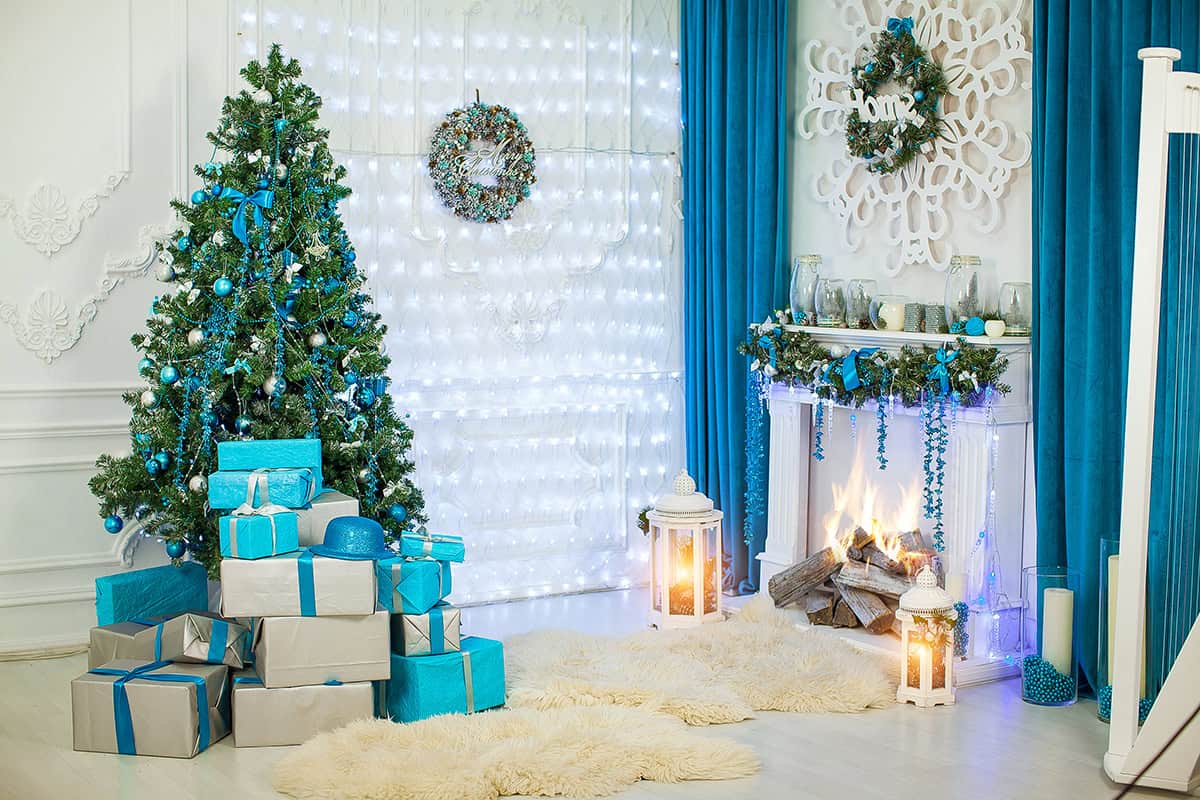 A Bright Living Room With Blue Gift Stack