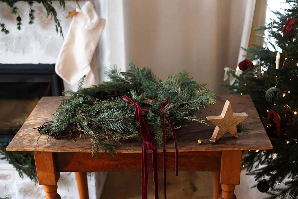 Fir, Ribbon and Wood on a Nordic Work Table