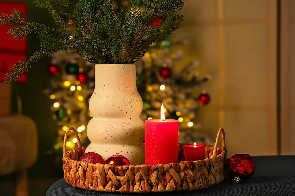 Red Candle and Pine Basket Arrangement