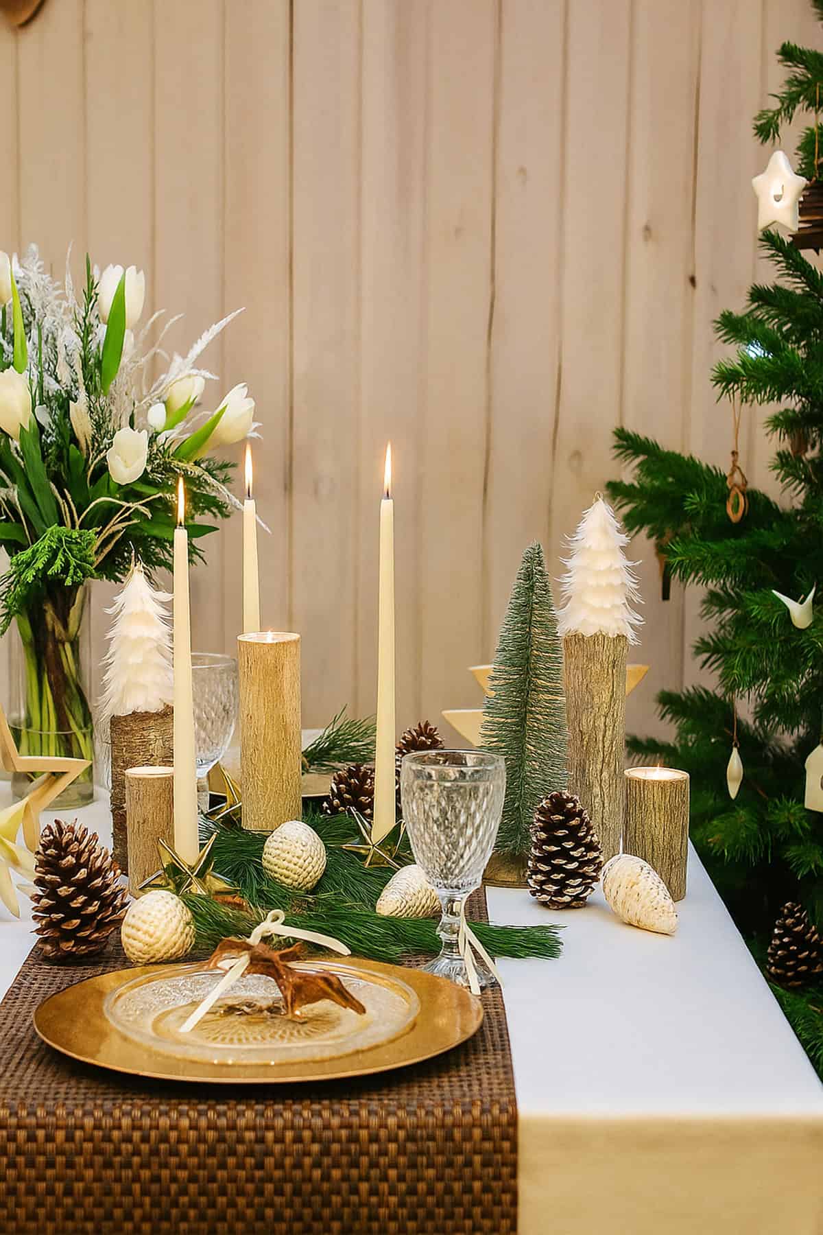 Table Setting with Tall Candles and Woodland Shapes
