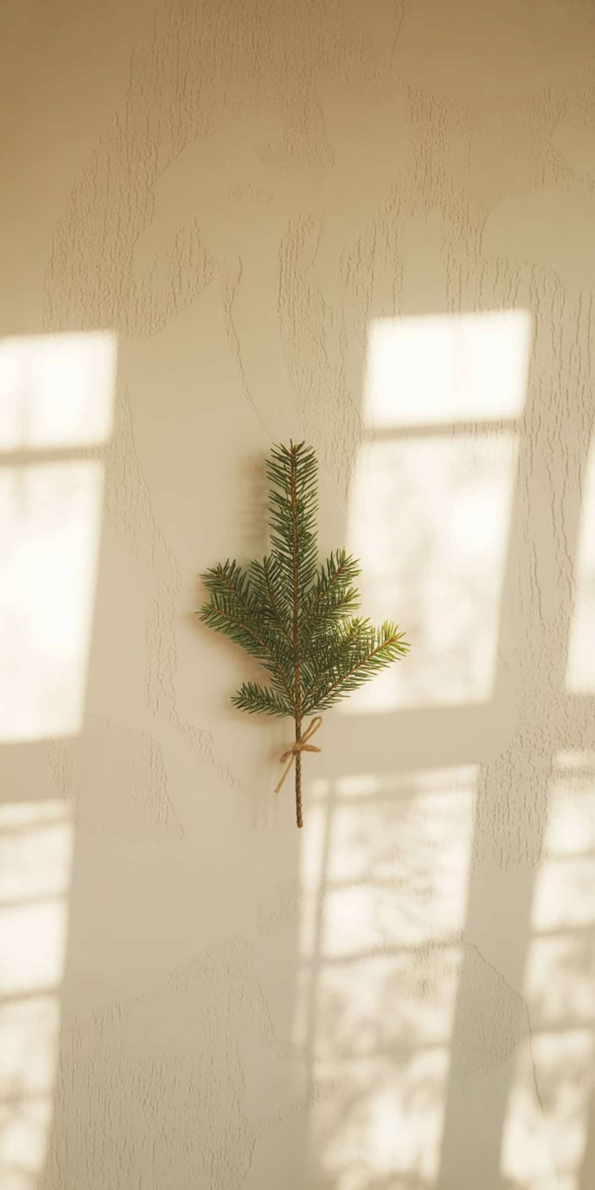 Tiny Pine Branch on Neutral Wall