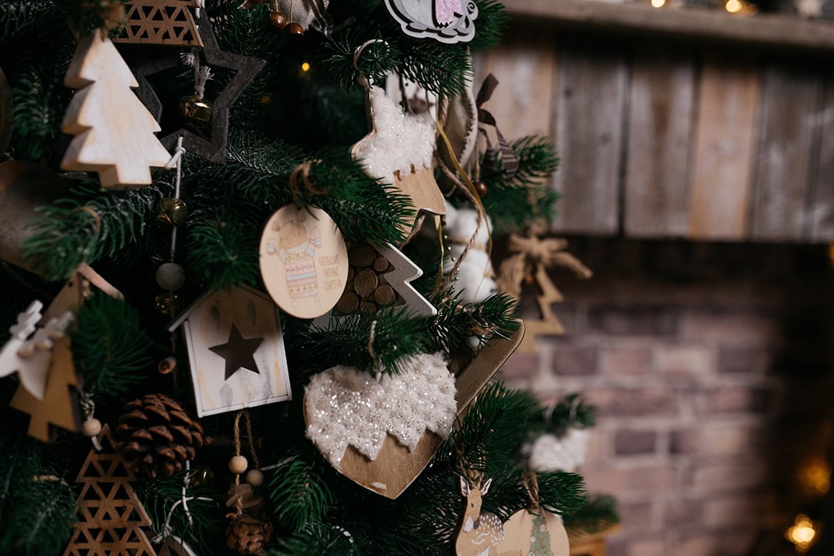 Tree Decor with Wooden Ornaments and Soft Natural Shapes