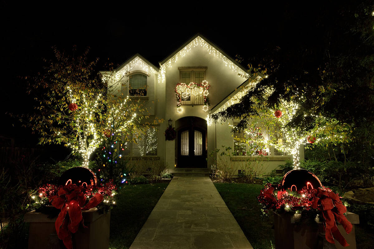 Warm White Lights Across a Two Story Home