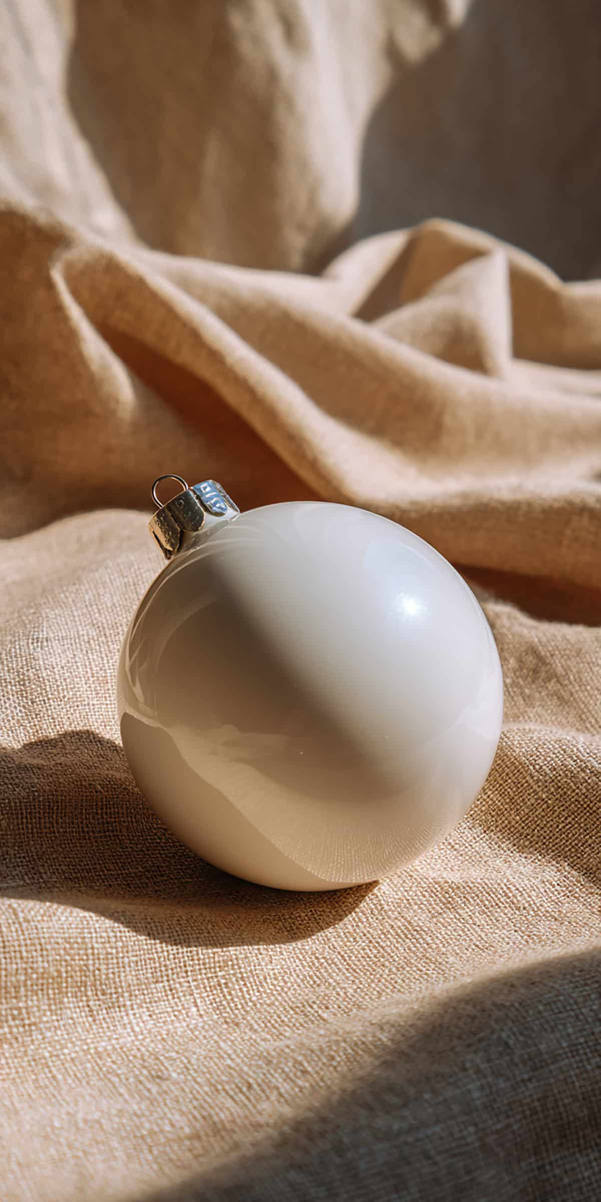 White Ceramic Ornament on Linen