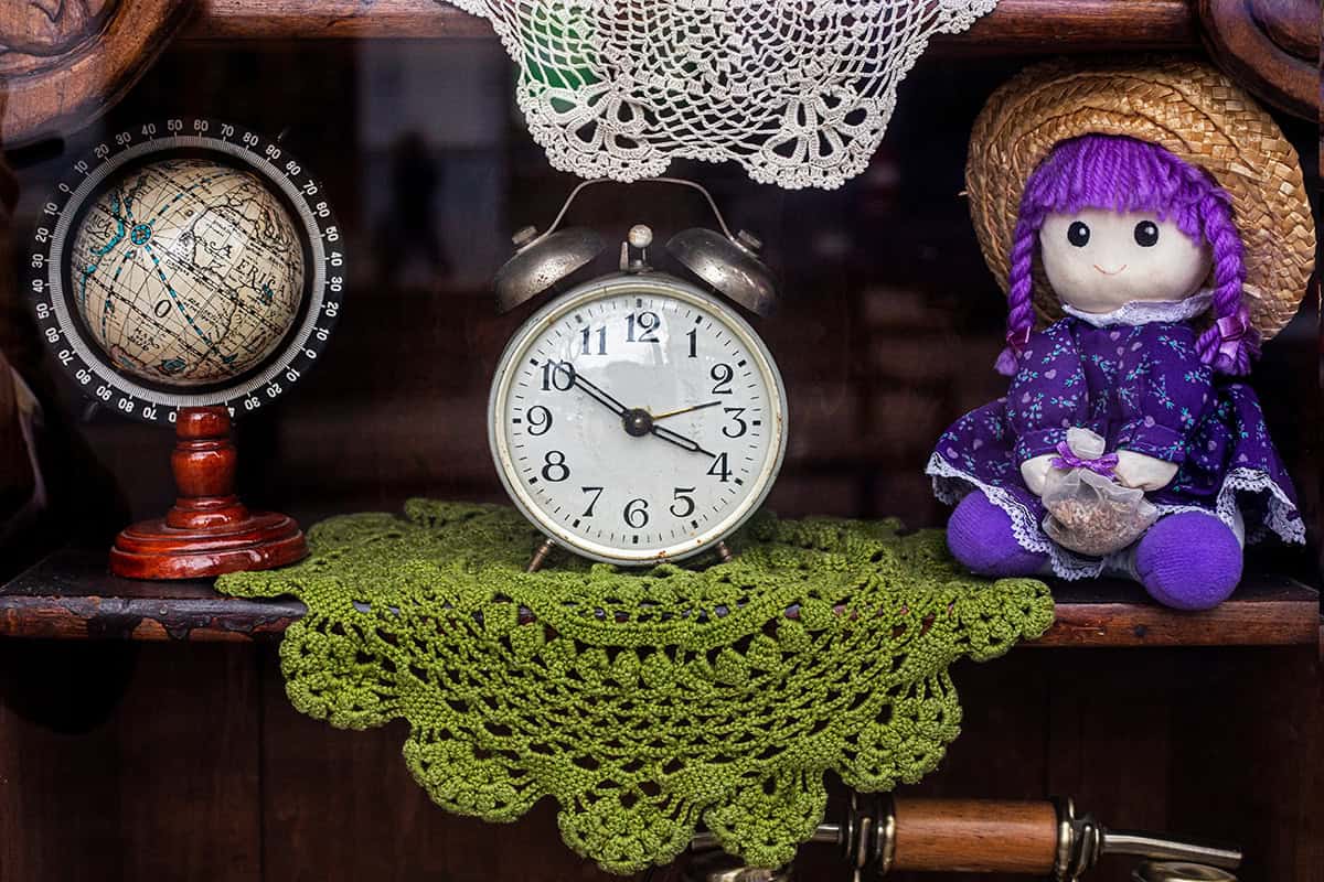 Personal Objects Forming a Quiet, Collected Mantel Idea