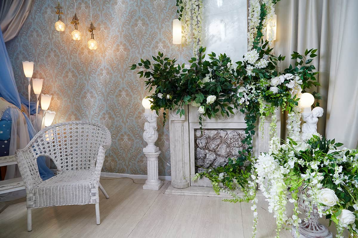 Tall Stems Framing White Florals Over Stone