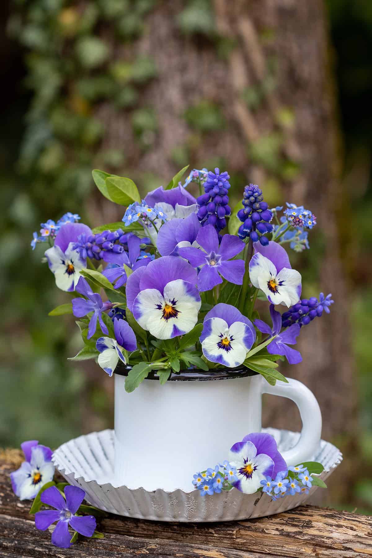 Violets and Hyacinths Gathered in a White Mug