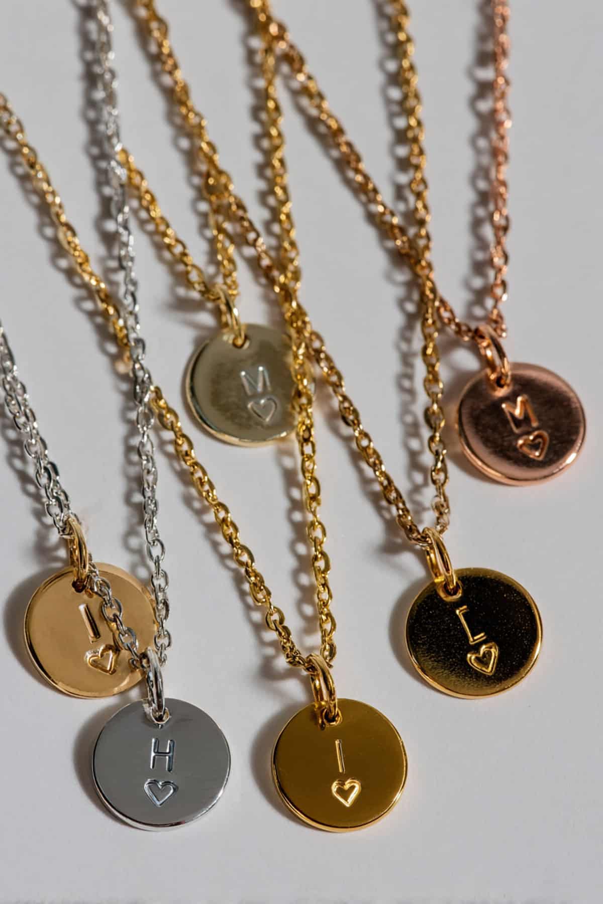 Hand Stamped Metal Initial Necklace With Tiny Heart